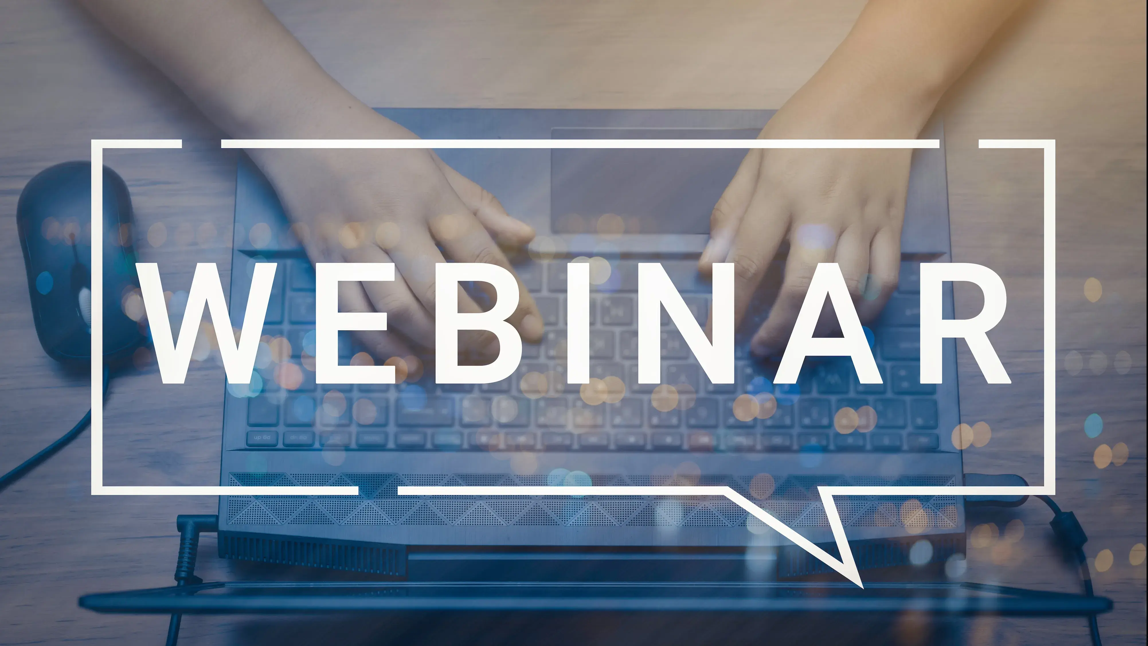webinar banner with a person using a laptop in the background
