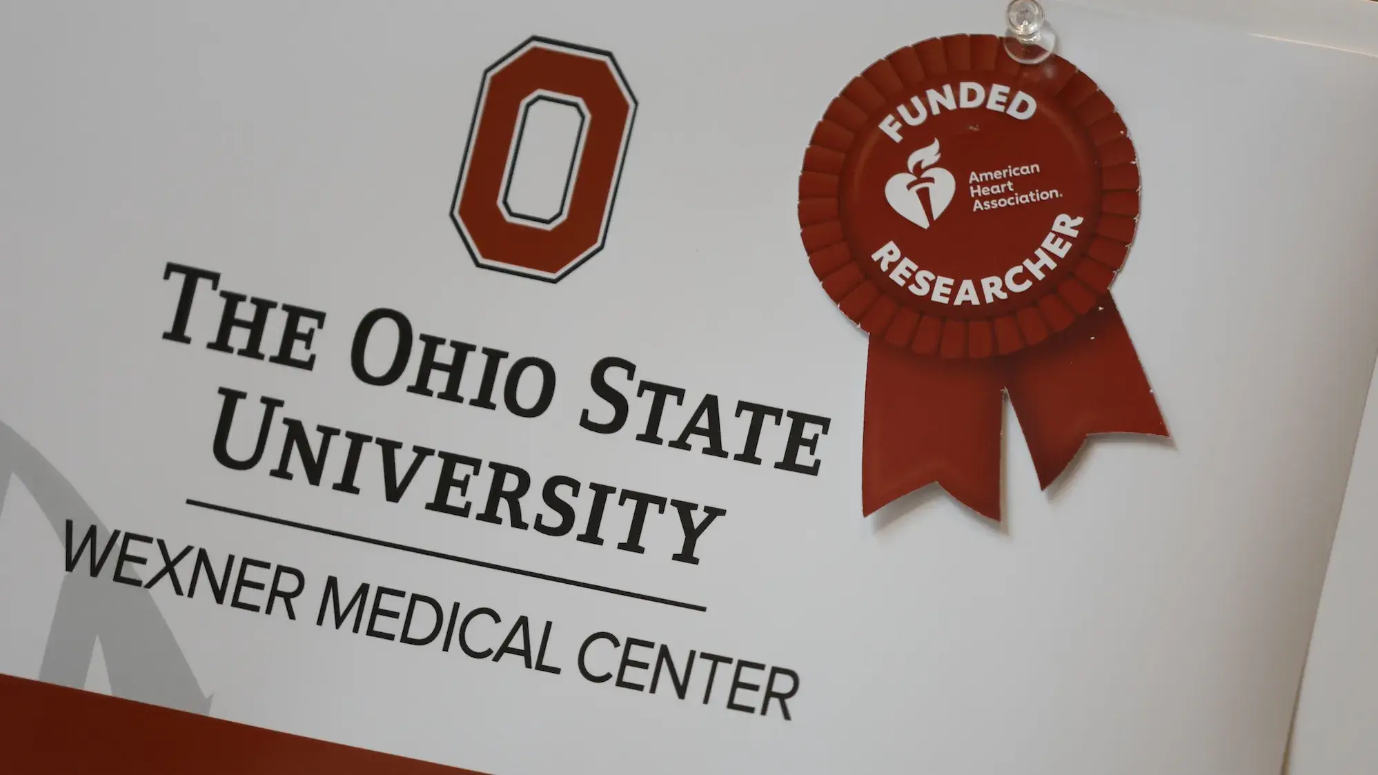 Funded researcher ribbon with OSUMC logo