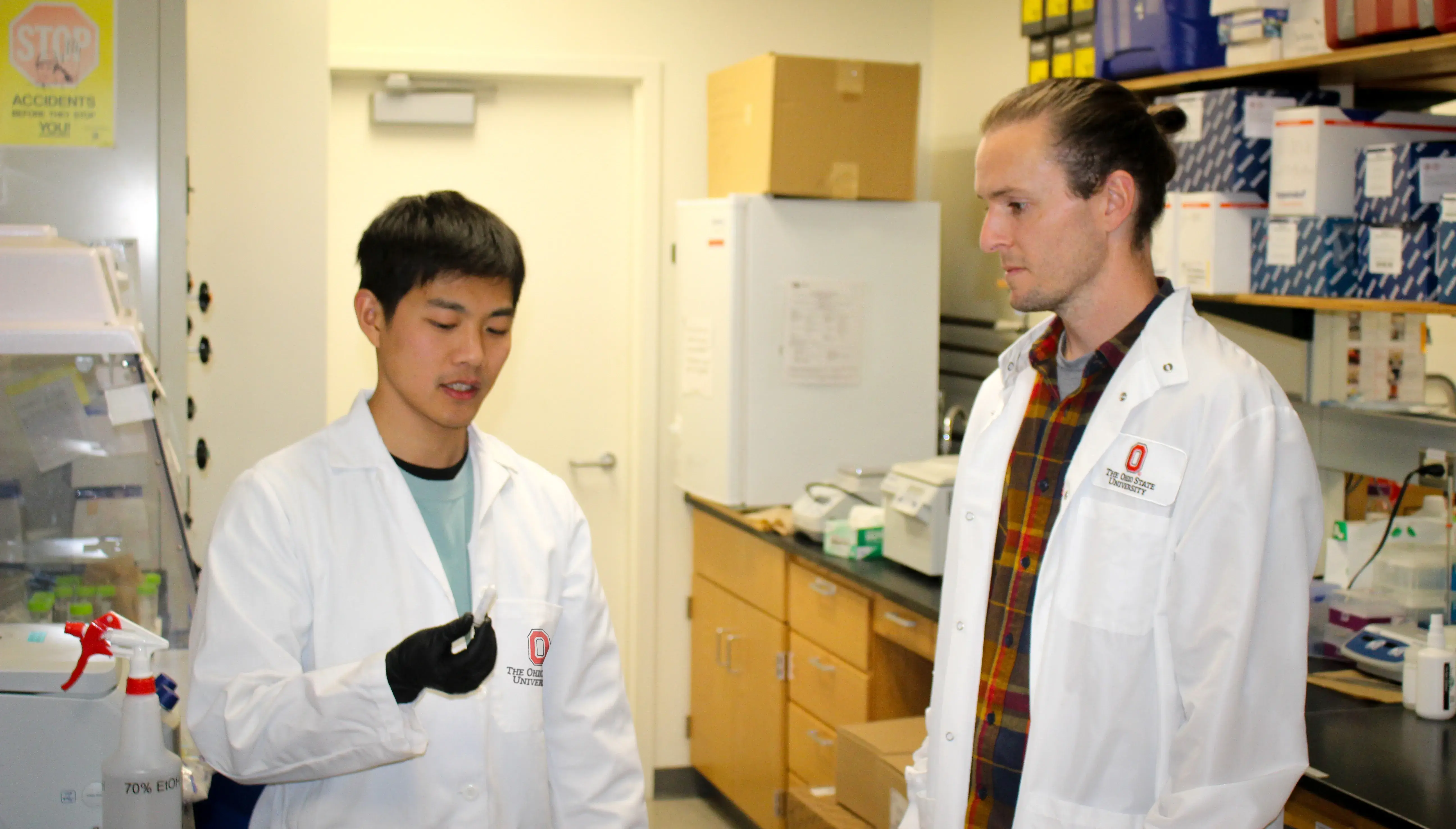 Dr. Garrett Smith interacting with scientist