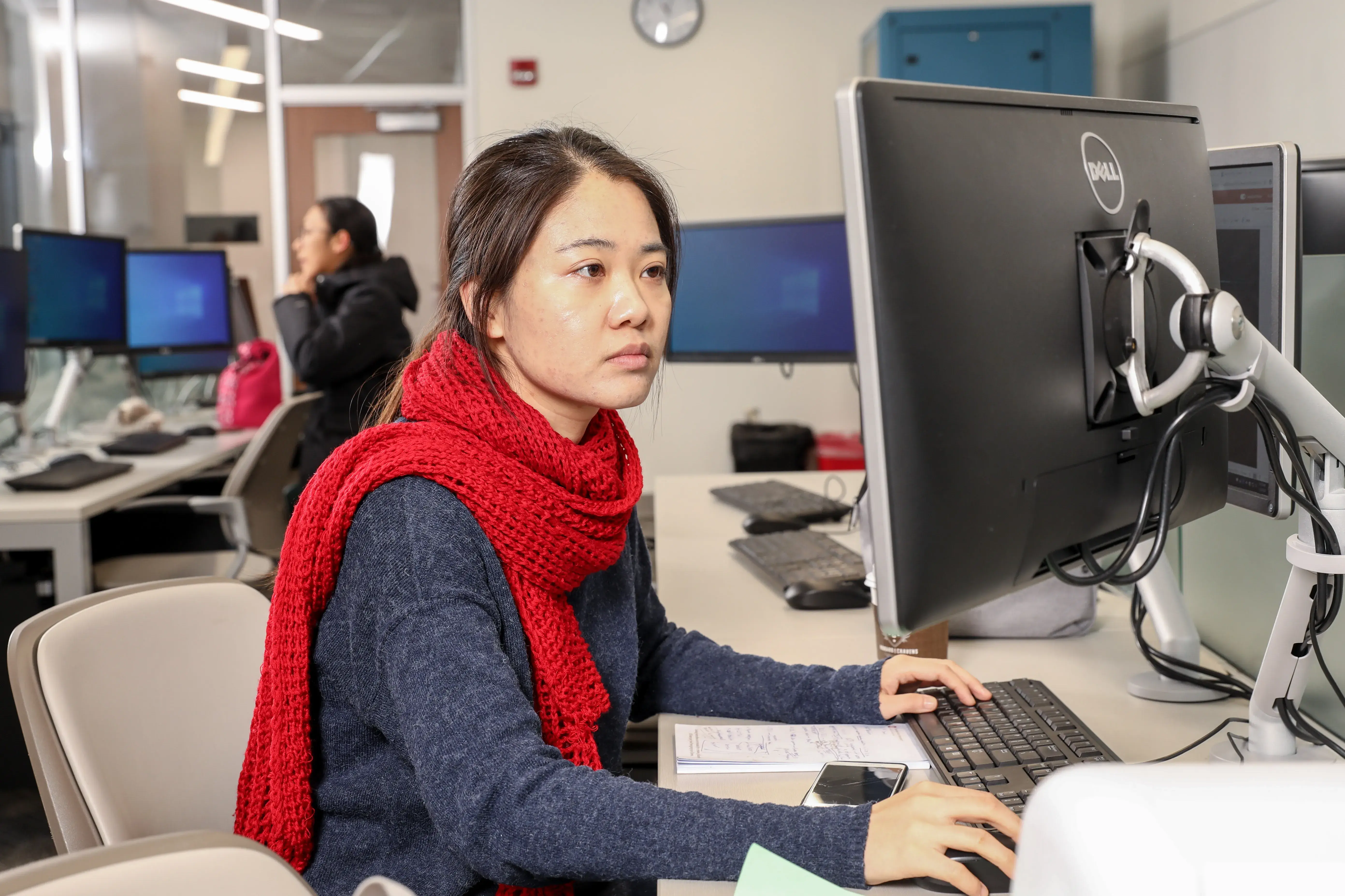 Woman working on computer in a lab